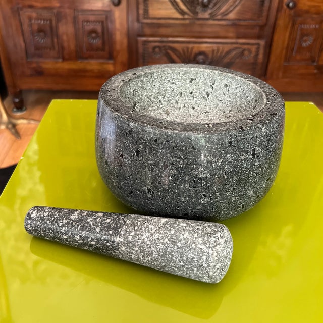 For consideration is the substantial stone mortar and pestle set. This collection is extremely heavy in weight.