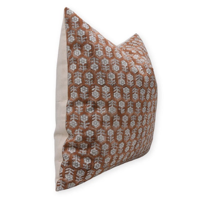 The Tulsi Buti cushion cover features a delicate hand block printed motif inspired by the sacred Tulsi plant, symbolizing...
