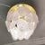 Ceiling lamp with a gold-plated top base. Frozen-effect glass, each piece individually crafted in the shape of a leaf....