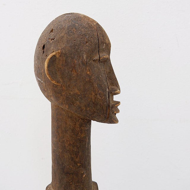Ethnic furniture - wabi sabi - African art Measures : 15x15cm H:68cm Estimated Date : Mid 20th Century Beautiful Lobi head...