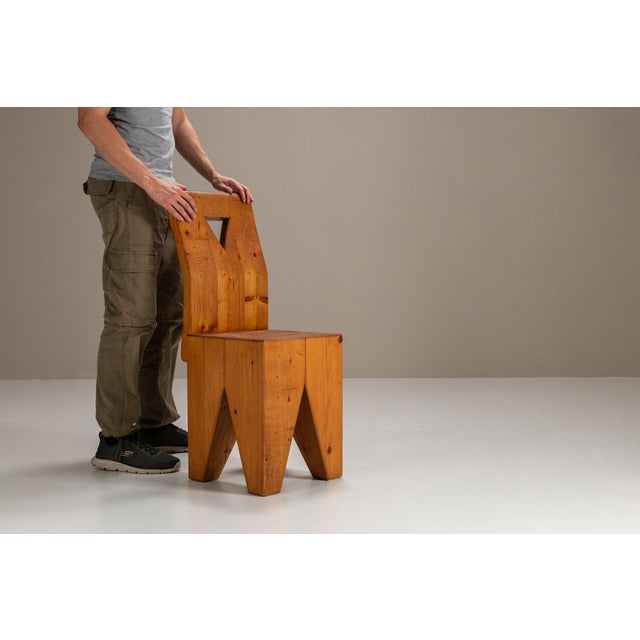 This set of two chairs was likely crafted in the 1970s or early 1980s, a period that saw a renewed appreciation for...