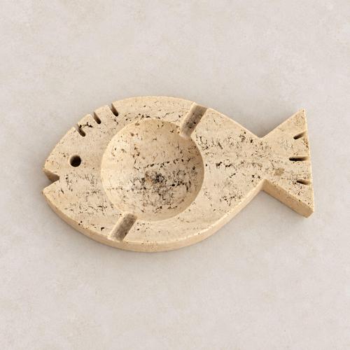 An Italian travertine marble ashtray from the 1970s, featuring a sculptural fish-like form and attributed to Fratelli...
