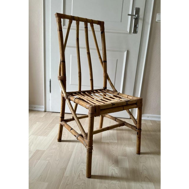 Indulge in the allure of mid-century Italian design with our finely crafted Rattan Chair from the 1950s. This masterpiece...