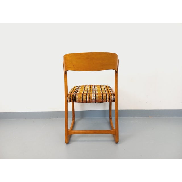 Baumann sleigh chair in light wood, seat completely reupholstered in the original, beautiful wool fabric in shades of...