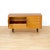 This vintage credenza was produced by ;Portwood Furniture, UK. This classy credenza is a striking piece from the 1950s and...