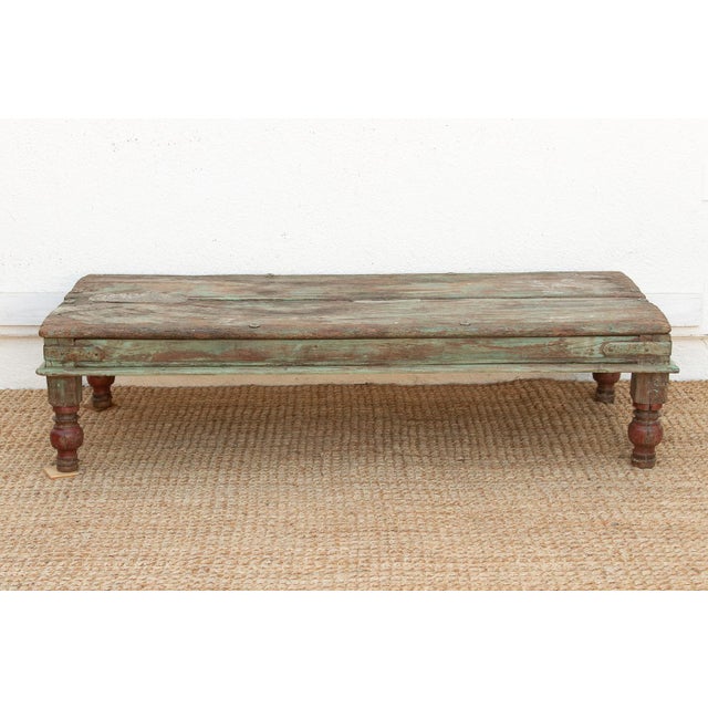 This authentic Takhat or traditional low table is a profound example of Folk Primitive design, sourced from the rural...