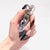 A fine signed silver money clip. By Tiffany & Co. In sterling silver. With a figural bald eagle's head handle. Fully...