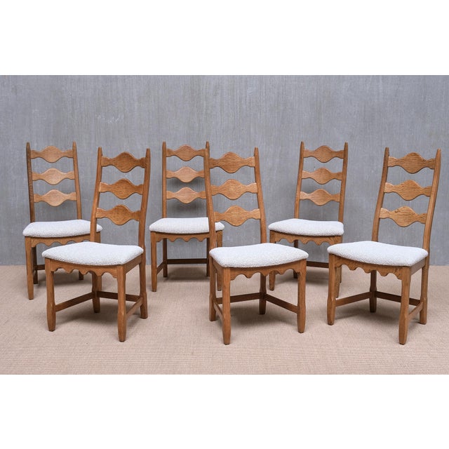 This striking set of six dining chairs was designed by Henning (Henry) Kjærnulf in the 1960s. Produced by Nyrup...