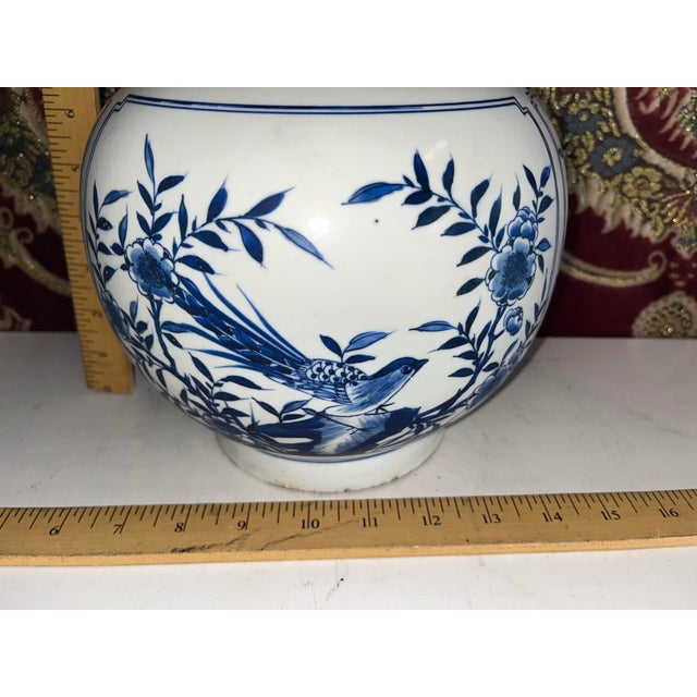 Beautifully designed vintage blue and white Asian style vase. Very well made with thick and heavy porcelain. This...