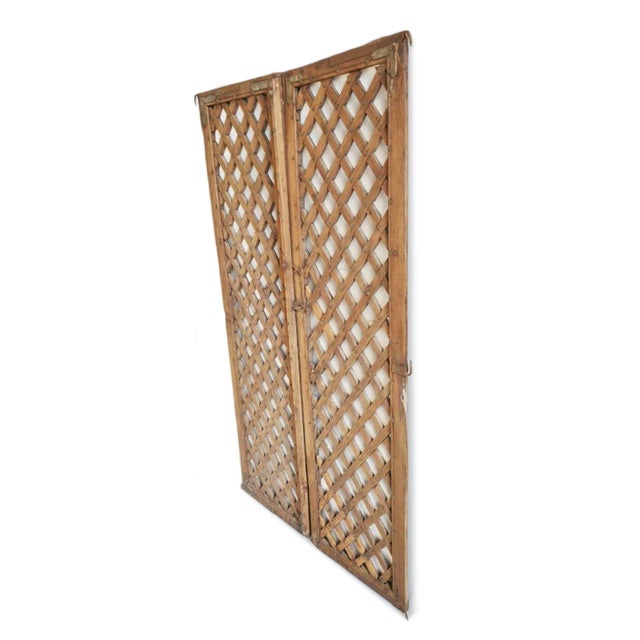 Original old wood lattice gate from India. Wonderful used as wall art or can be fashioned by your contractor for use as a...