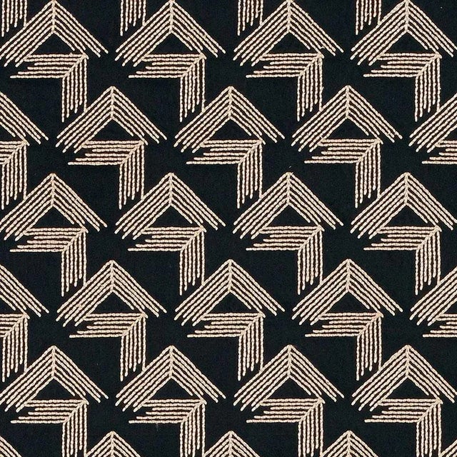 Inspired by a document in our archives, this design evokes Art Deco and 1920s Chinese motifs. Rough, matte embroidery on a...