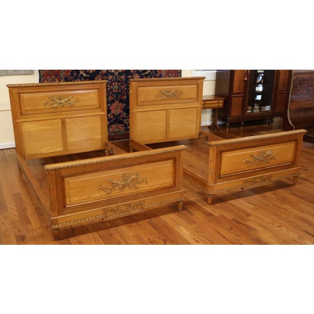 Pair of 1920's Era Oak French Louis XVI European Small Double Beds Dimensions : 45.5" Tall X 81" Long X 52" Wide Mattress...