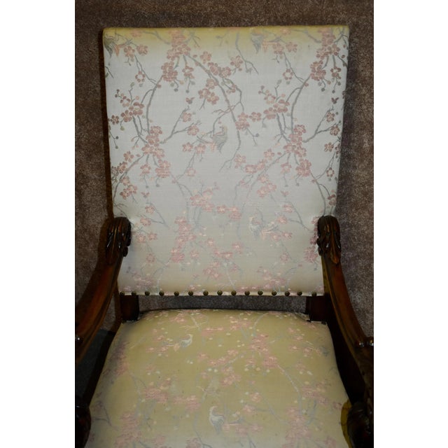Vintage (1940s) High Back Chair has a French Style. The Wood is Walnut. Carved Wood. Stretcher Base. Cherry Blossom Fabric...