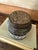A charming mid-century pottery tobacco jar marked “TOBAK,” likely of Italian origin, featuring a wonderfully textured...