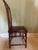 This elegant rosewood chair is crafted from solid premium rosewood and showcases exquisite hand-carved details throughout....