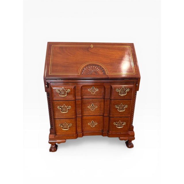 A beautifully crafted early 20th century Federal Revival secretary desk, executed in richly grained mahogany with refined...