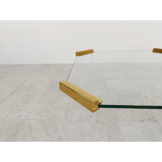 Pair of brass, acrylic glass and glass side tables. Timeless seventies/eighties glam pieces. Good condition 1970s -...