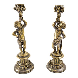 19th Century Pair of French Silvered Bronze Candlestick in Cherub or Putti Form For Sale