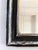 Antique French Louis Philippe mirror, dating to the late 19th century. The mercury glass mirror features a black-painted...