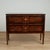 Handsome neoclassical chest crafted in mahogany featuring a flame grained top with cross banding on a case with two cross...