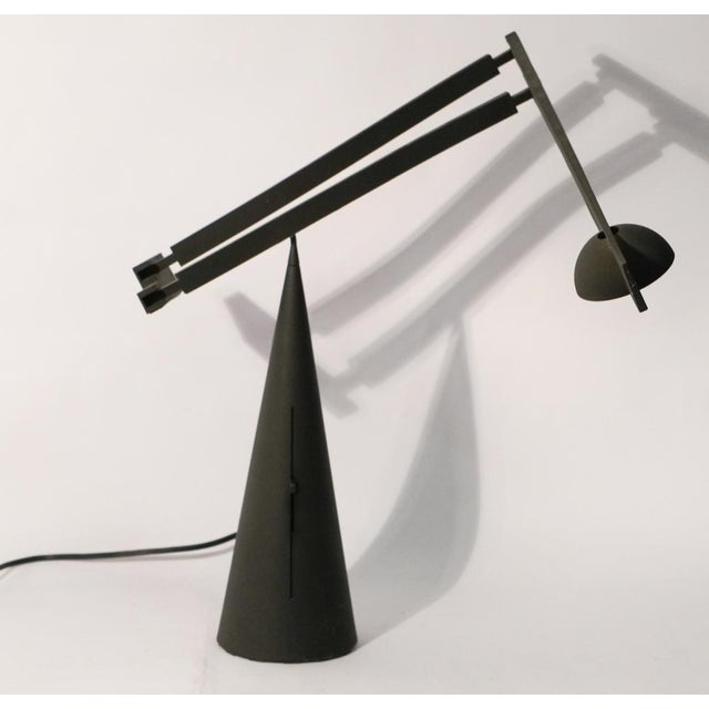 A sculptural 1980's Italian-designed table lamp by Mario Barbaglia and Marco Colombo for Italiana Luce. The lamp is made...