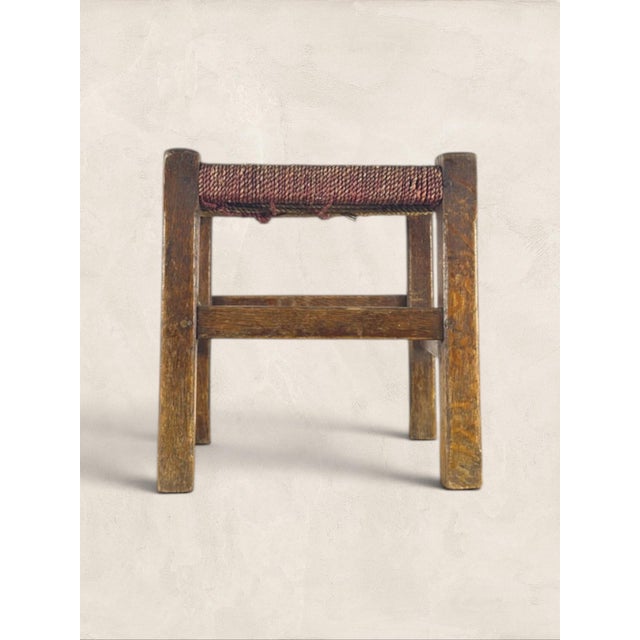 Antique English Oak Stool with Woven Rush Top Solid oak and hand-woven rush, this little stool carries the kind of quiet...