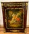 Celebrate the timeless beauty of French artistry with this exceptional Louis XVI-inspired accent cabinet. Expertly...