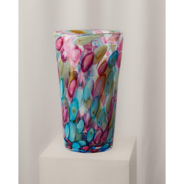 Vase made using the traditional glassblowing technique with colors incorporated into the body. Pino Signoretto opened his...