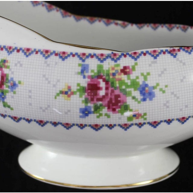 Add a touch of timeless English elegance to your table with this Royal Albert Petit Point Gravy Boat featuring its...