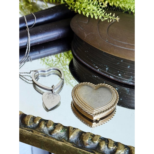 Vintage Tiffany & Co. sterling silver Heart on Heart pendant necklace featuring a large open heart frame suspending a...