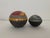 Two South African Raku Lidded Round Pottery Boxes Patchwork Handmade Mint Measures approximately 3.5" x 3.5" and 3"x 2.5".