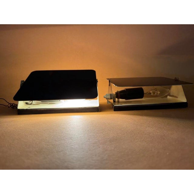 First edition of Charlotte Perriand's wall lights, commissioned by the French National Railway Company (SNCF) I have...