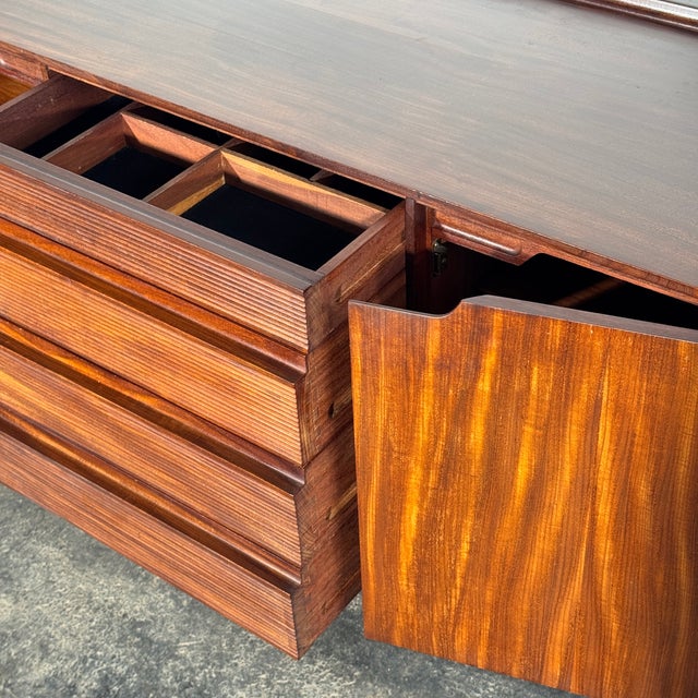This sideboard is designed by richard hornby for fyne ladye furniture, a distinguished british mid-century brand known for...