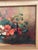 This vintage oil painting still life floral by W. Rüegg from 1931 captures the essence of era with its intricate detailing...