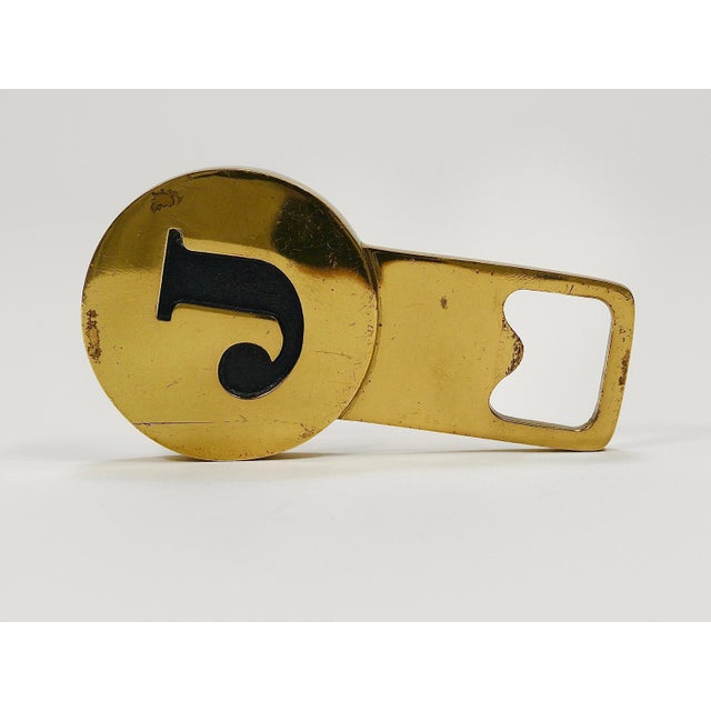 One (1) beautiful mid-century bottle opener featuring the initial "J", crafted from solid, polished brass. Model #4919,...
