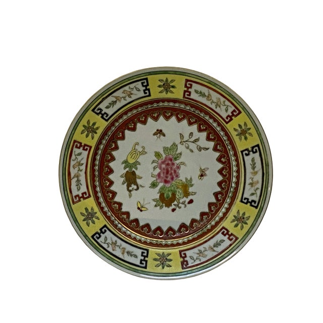 Immerse yourself in the timeless allure of the Orient with this exquisite Chinese decorative plate. Crafted with a...