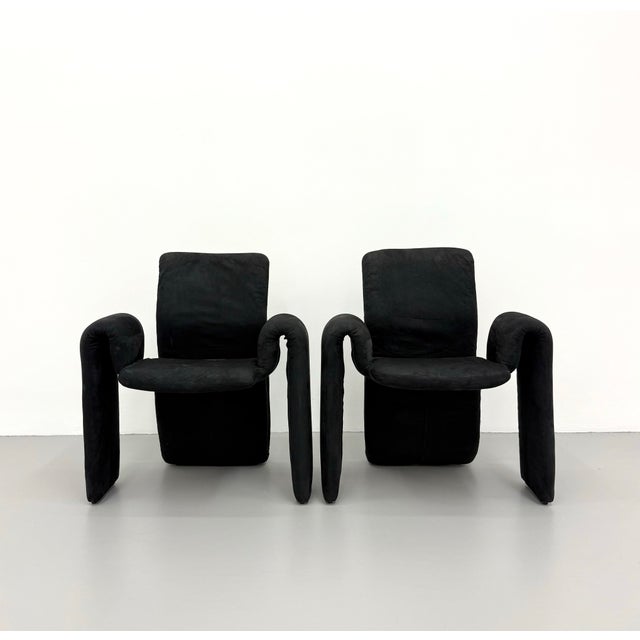 A striking pair of vintage postmodern lounge chairs upholstered in supple black suede. Defined by their bold architectural...