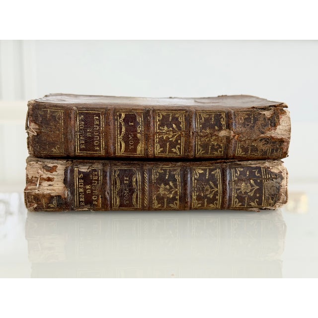 Authentic 18th-century French medical books printed in Paris in 1739, Recueil des remèdes faciles et domestiques is a...