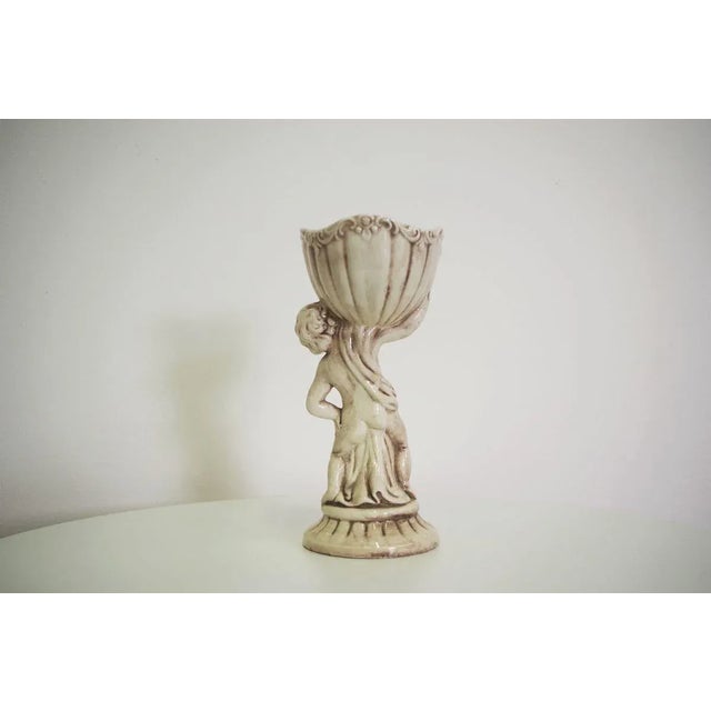 Mid-Century Ceramic Cherub, in Good conditions. Designed 1970 to 1979 This piece has an attribution mark, I am sure that...