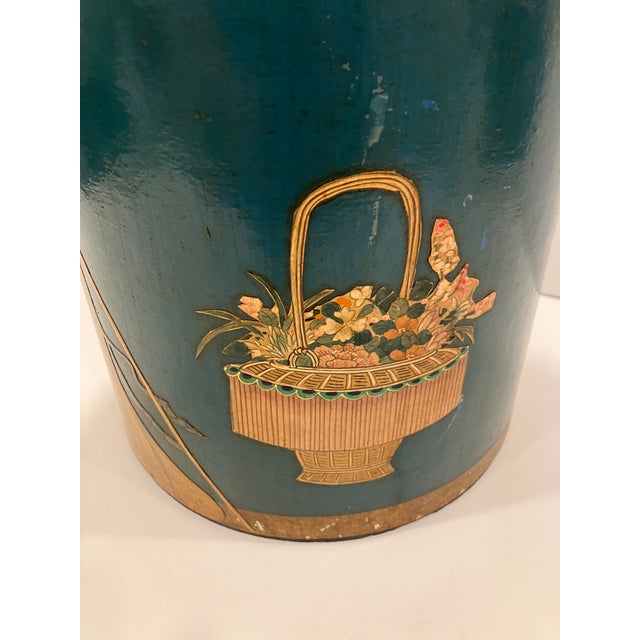 This 40’s vintage wastebasket features a decoupage Chinese courtesan and basket of flowers The wood cylinder was painted a...