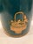 This 40’s vintage wastebasket features a decoupage Chinese courtesan and basket of flowers The wood cylinder was painted a...