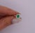 2/3 Carat Natural Emerald & Diamond Oval Halo 1.7mm Band Ring in 18K White Gold, Size 5.5 For Sale - Image 9 of 10