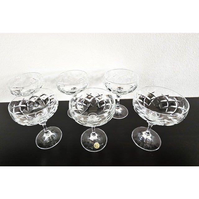 Elevate your next gathering or bar cart display with this exquisite set of six (6) vintage champagne coupes/sherbet...