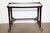 Solid Rosewood and Glass Serving Cart on four casters, Made in Italy. Featuring an open smooth sculpted rectangular...