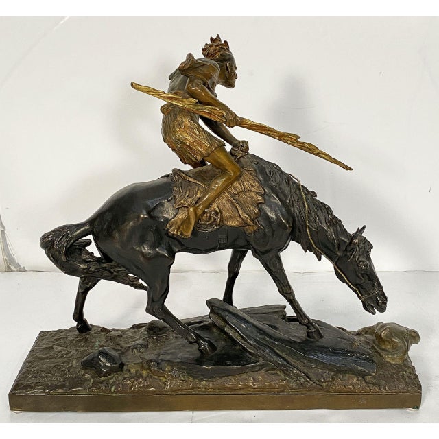 A fine patinated bronze sculpture of a Native American warrior on horseback by the celebrated French artist and sculptor,...