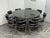Design Plus Gallery presents a Late 20th Century Table + Set of Eight Chairs. The set has a round table with eight...
