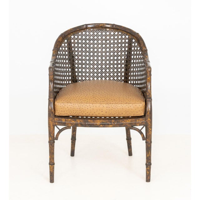 Tortoiseshell Finish Faux Bamboo Cane Paneled Tub Chair, with faux ostrich skin upholstered cushion. 33" H x 23" W x 22.5"...