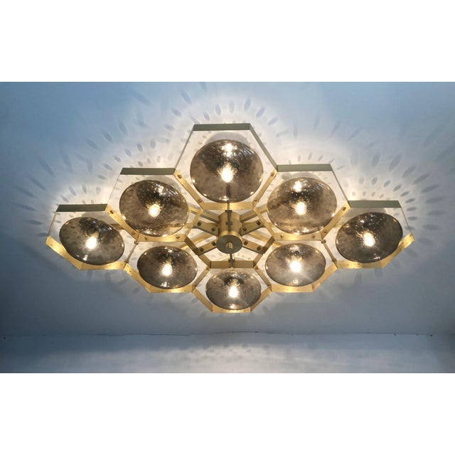 Italian midcentury flush mount with eight smoky Murano glass shades carefully hand blown with bubbles inside the glass...