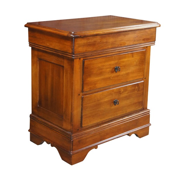 A vintage pair of Lexington Furniture Louis Philippe nightstands. Made from cherry, showcasing restrained, sophisticated...