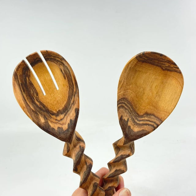 A set of wood hand-carved spoons. Made throughout eastern Africa where renewable and sustainable deciduous tree resources...